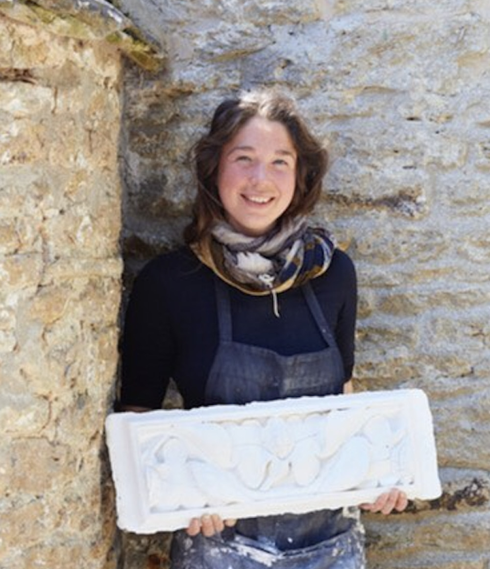 Esme holding a maquette