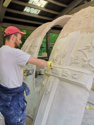 Student applying soft cast enrichment on rib moulding