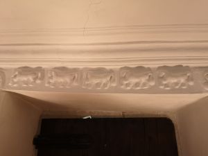 Early English frieze of horses